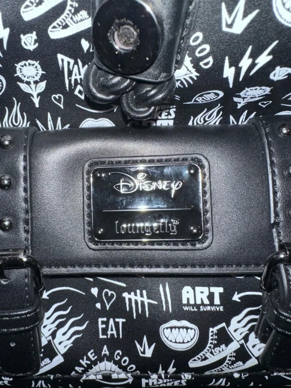 Cruella Deville Loungefly Black & White Graphic Mini Backpack with Chain Detail‎